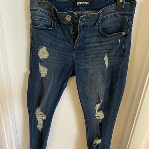 Express dark wash ripped mid rise stretchy jeans
